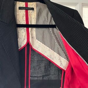 Black pinstripe blazer with accent cuffs & a silk patterned interior